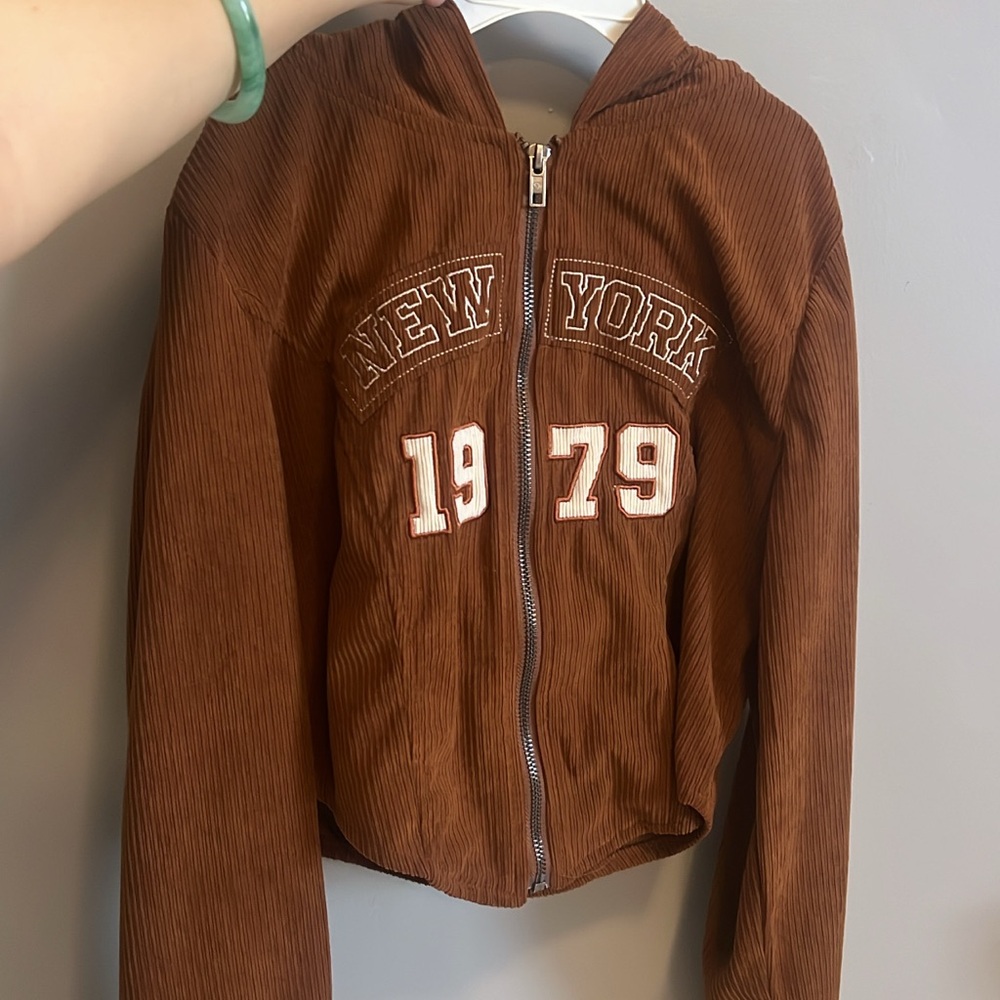 Brown zip up ruffle Jacket with New York Design